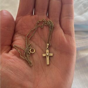 Gold color cross necklace with pearl detail